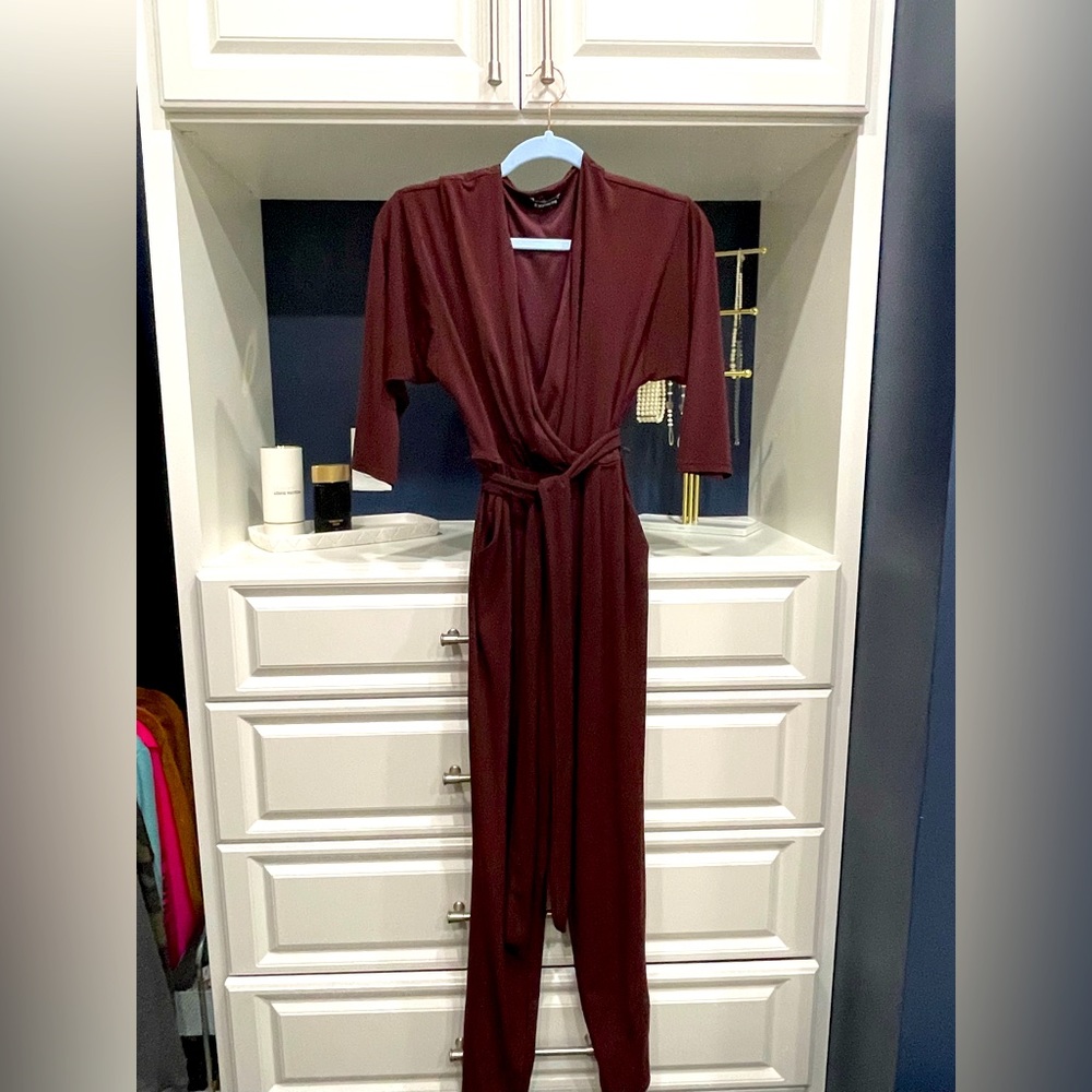 Express Classy Jump Suit with pockets XS TP Good condition looks great on